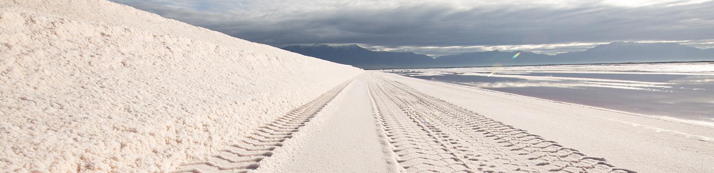 Salt windrow during harvest | Compass Minerals